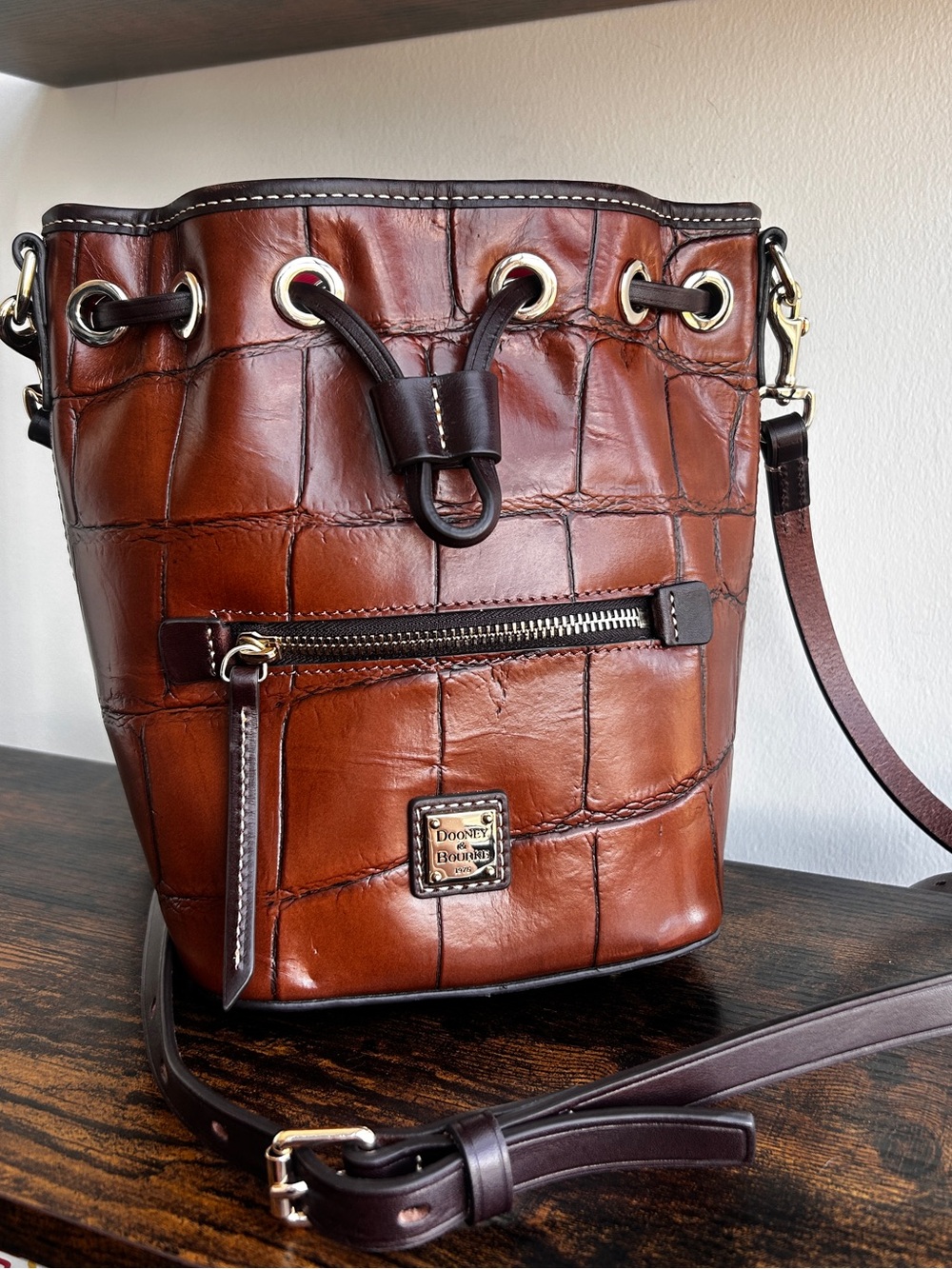 Dooney & Bourke Croc Embossed Leather Drawstring Bucket Crossbody Cognac